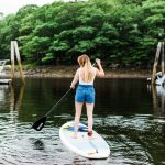 Woman stand up paddle boarding yachtsman hotel marina club bar kennebunkport maine