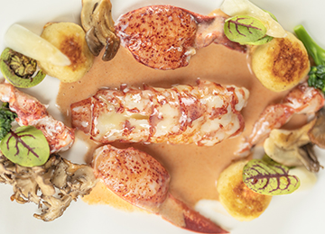 butter poached lobster and scallops at ocean restaurant at cape arundel inn kennebunkport maine resort collection hotel